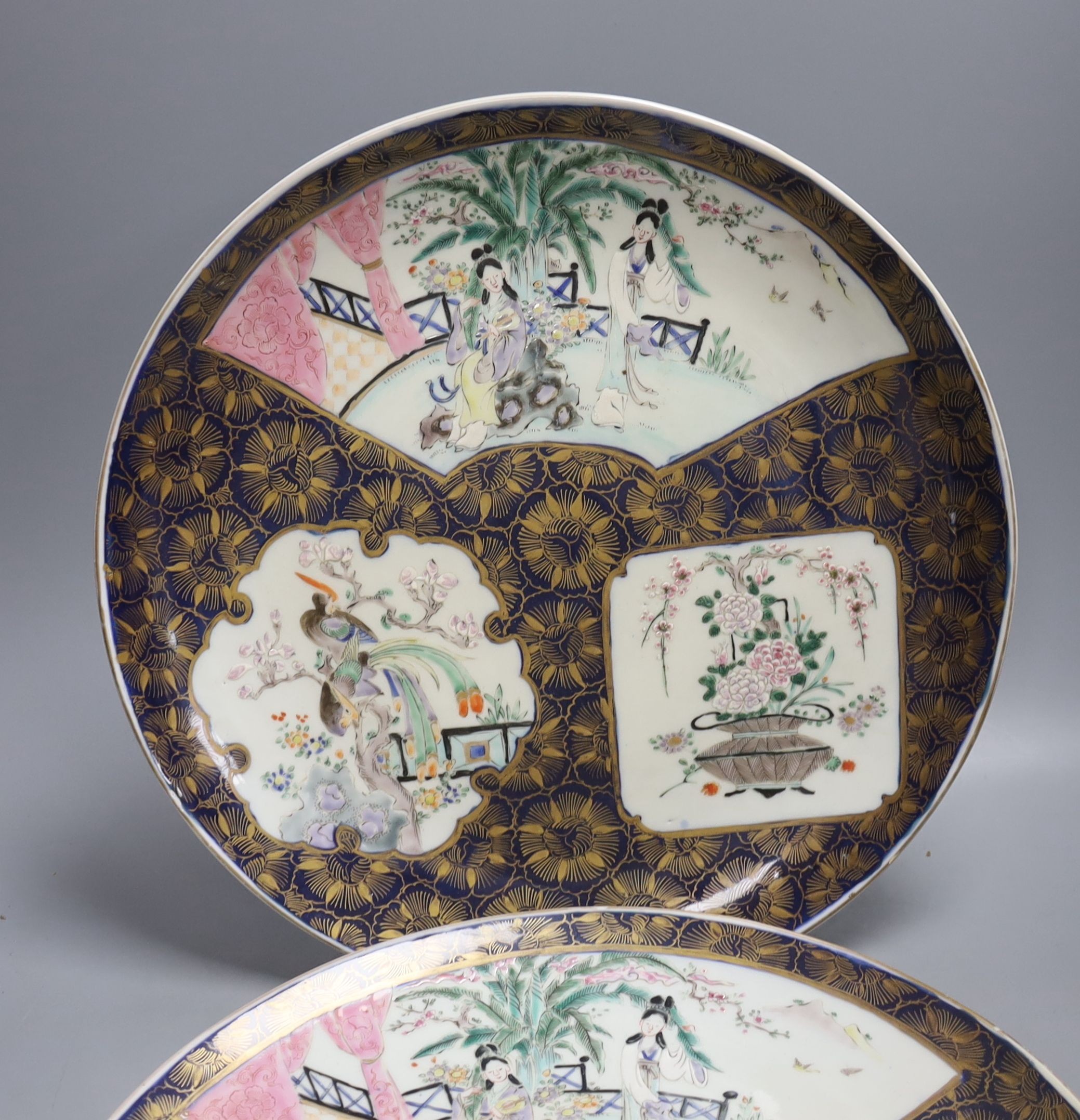 A pair of Japanese enamelled porcelain dishes, Meiji period, 36.5cm.